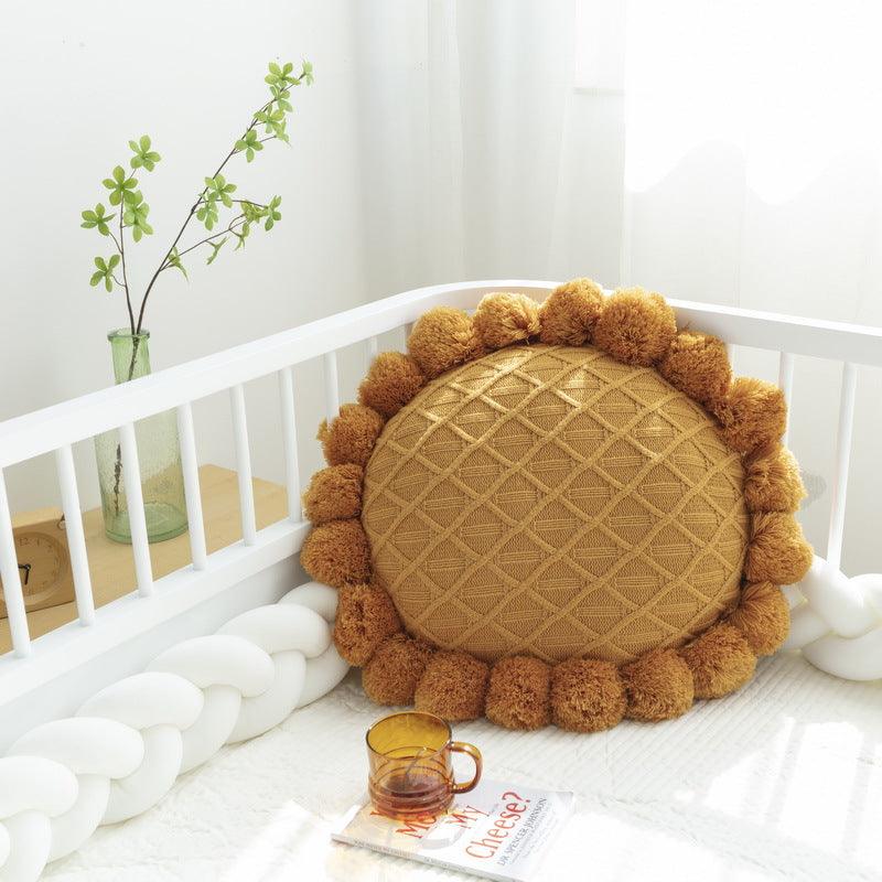 Almohada de punto grueso con forma de girasol